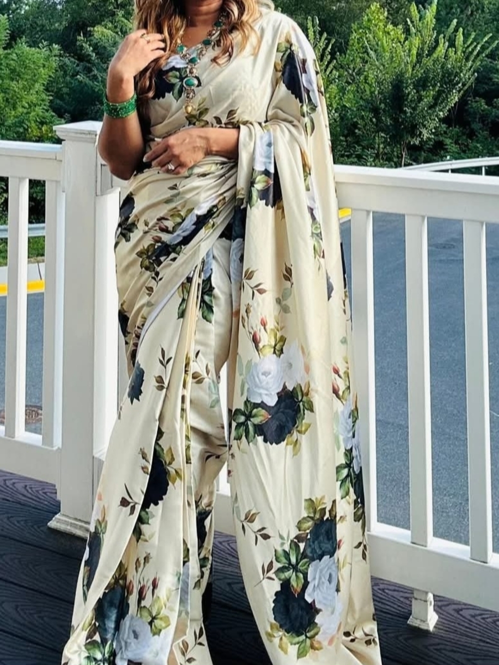 Cream Floral Satin Saree with Green and Black Blooms